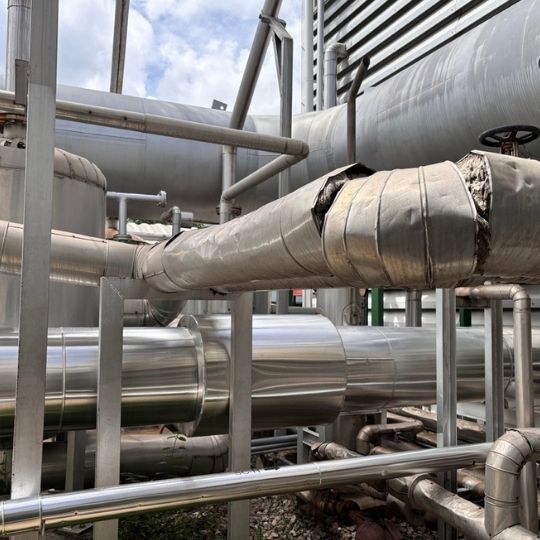 Damaged Piping and Insulation Showing During An External Roof Inspection
